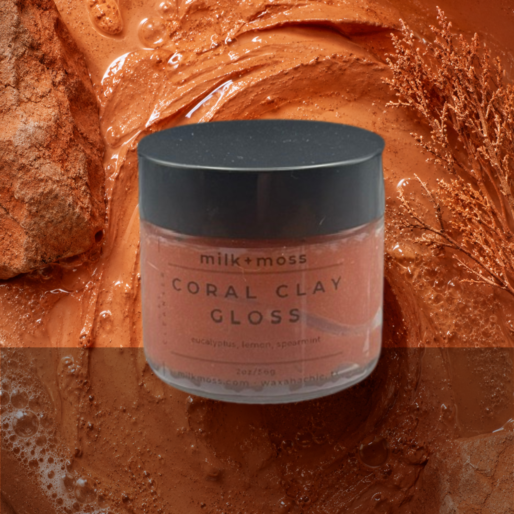 Jar of coral clay gloss with a textured orange background