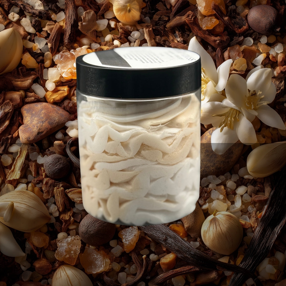 Jar of white cedar on a bed of dried herbs and flowers